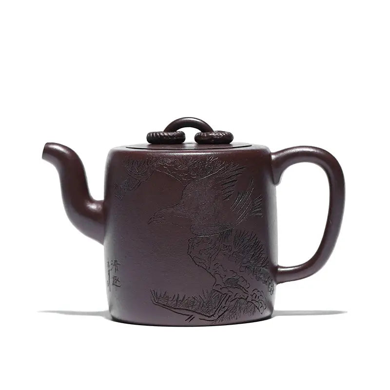 Brown Yixing Zisha teapot with carved crane and pine motif in Soaring Tranquility design