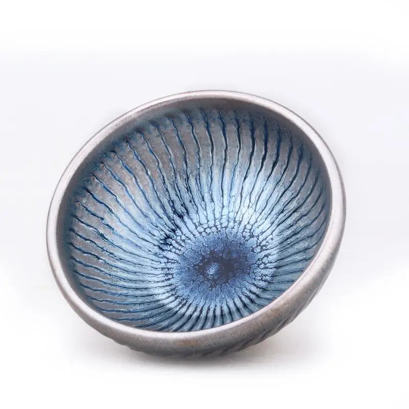 Blue and silver ceramic bowl from Spiral tenmoku collection, perfect for tea ceremonies