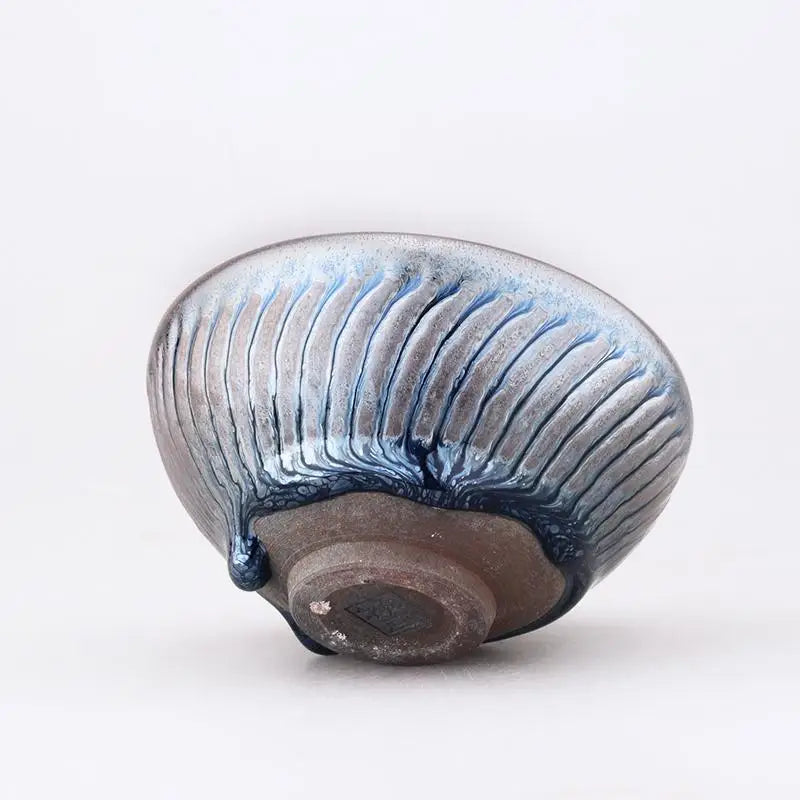 Glazed ceramic bowl with ribbed texture from Spiral tenmoku collection, perfect as a tenmoku tea cup