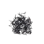 Loose black tea leaves from Spring Beauty Tanyang Gофu Black Tea showcasing expert tea craftsmanship