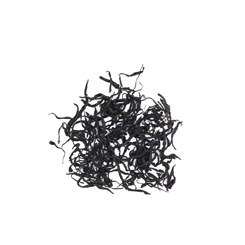 Loose black tea leaves from Spring Beauty Tanyang Gофu Black Tea showcasing expert tea craftsmanship