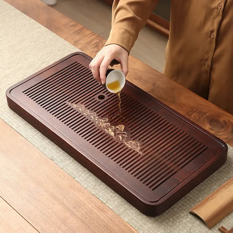 Rectangular slotted wooden tea tray from Still Waters bamboo tea collection