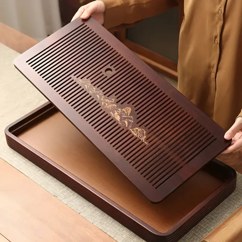 Rectangular bamboo tea tray with slotted top for serving tea in Still Waters Bamboo Tea Tray