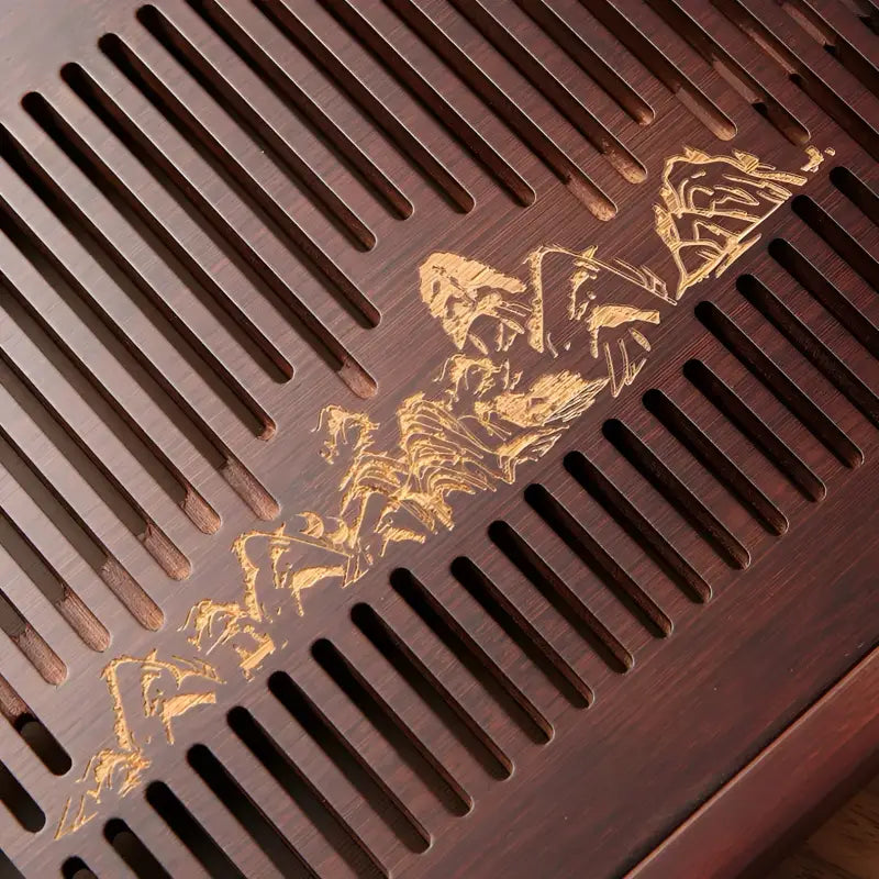 Slatted bamboo tea tray with mountain engraving from Still Waters bamboo tea collection