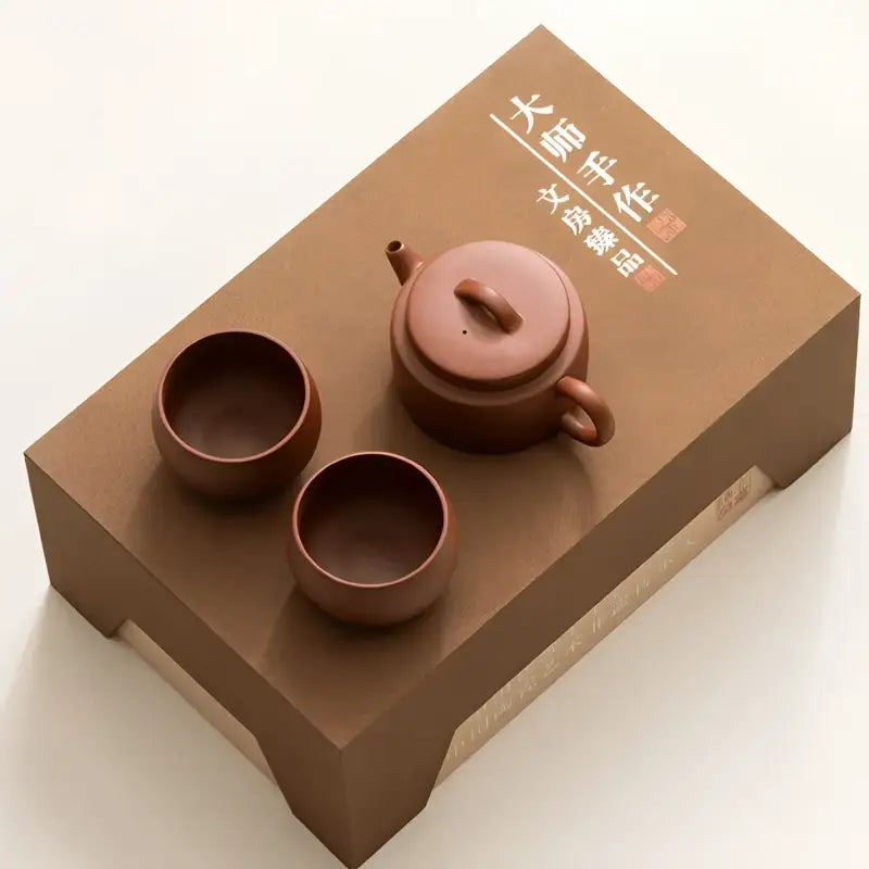 Brown ceramic Stillness Tea Set featuring yixing zisha teapots and zisha teapot design