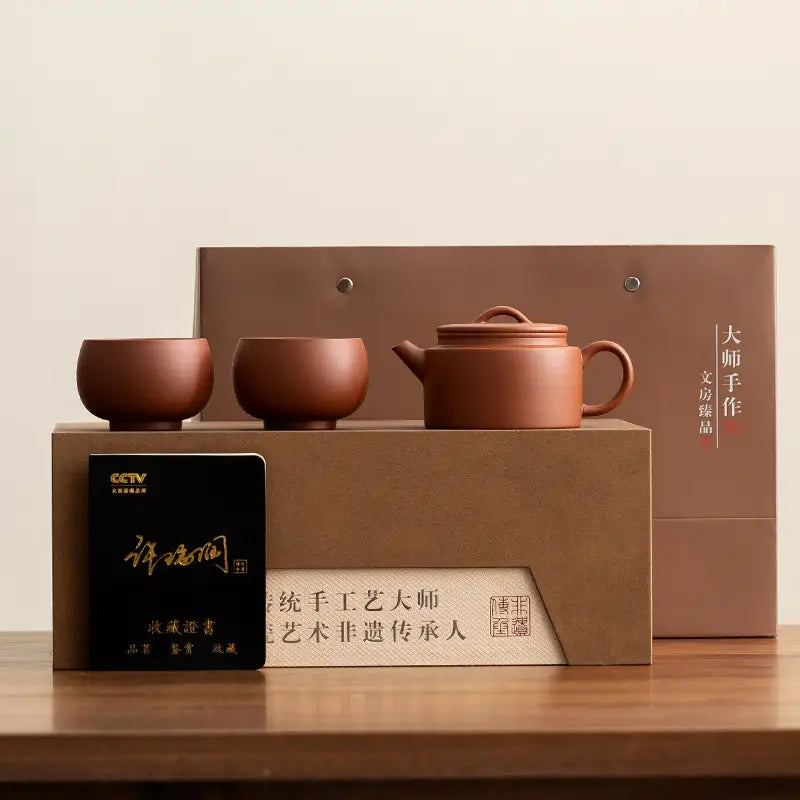 Earthenware Stillness Tea Set with gift packaging featuring Yixing Zisha teapot design