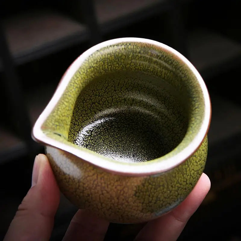 Green ceramic creamer with crackled Jianyang glaze from the Sunflower Tea Set for gongfu tea