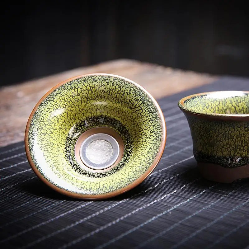 Green and brown ceramic teacups from Sunflower Tea Set with Jianyang glaze for Gongfu tea