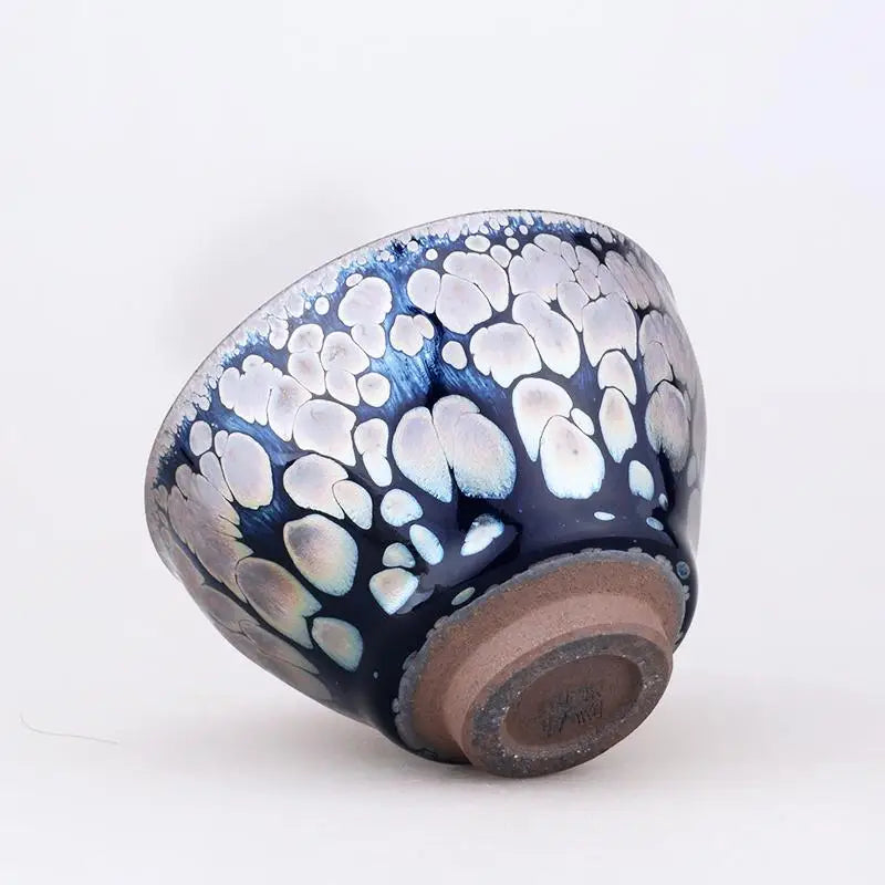Blue and white glazed ceramic bowl from Sunrise, a handcrafted Jian Zhan for radiant glaze tea