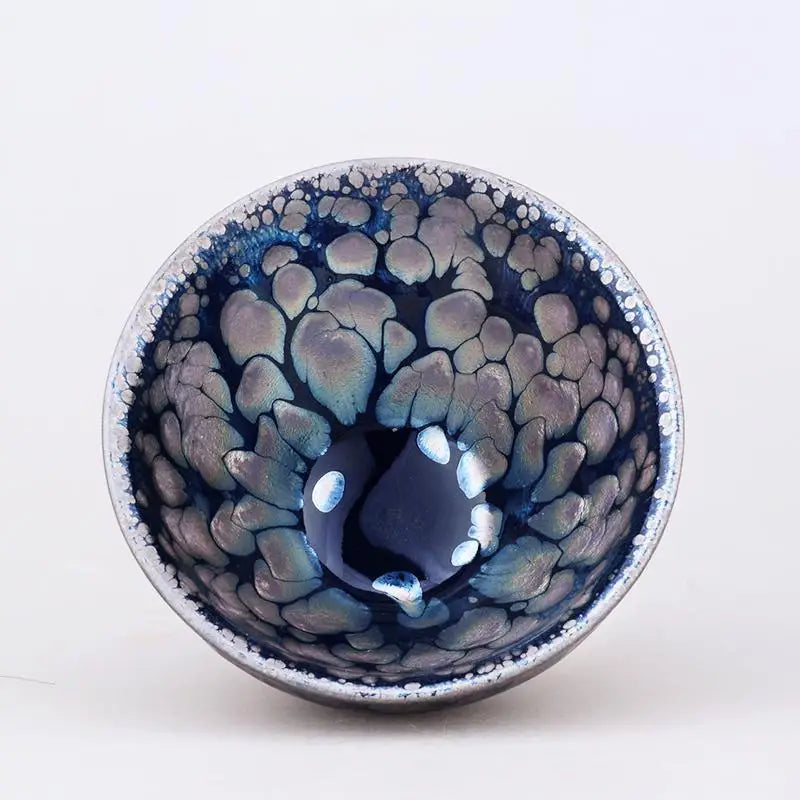 Iridescent blue and silver handcrafted Jian Zhan ceramic bowl from Sunrise radiant glaze tea collection