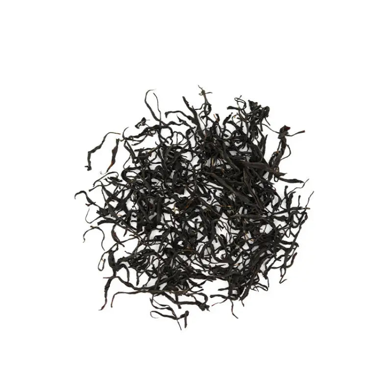 Pile of dried Tanyang Black Tea leaves with a delicate floral aroma and elegant floral notes