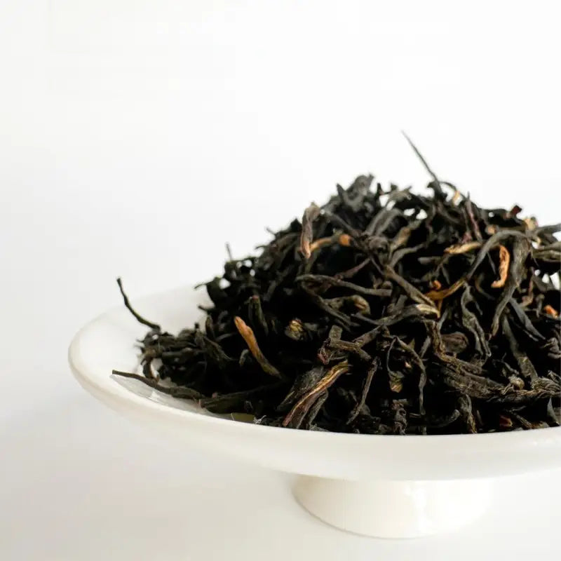 Loose black tea leaves from Tanyang Black Tea with a delicate floral aroma and elegant floral notes