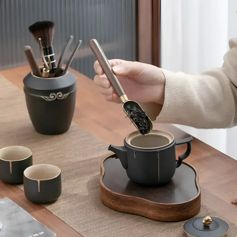 Black tea set with wooden accents for Gongfu Tea ceremony tool set featuring Six Gentlemen style