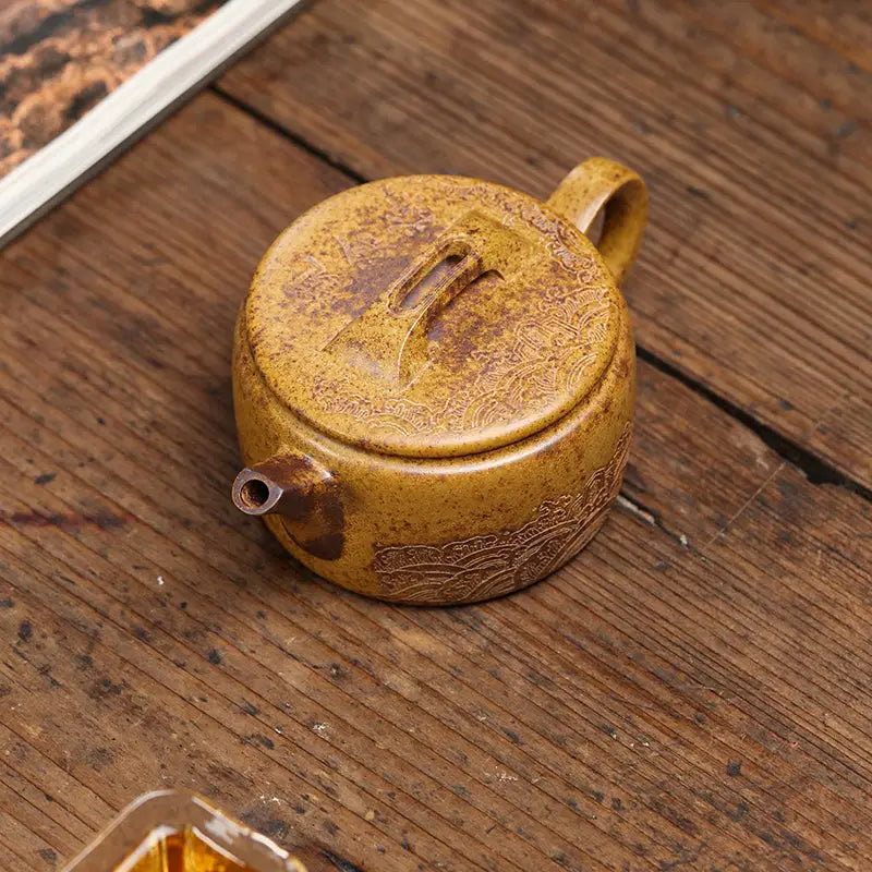 Round textured yellow-brown Yixing Duanni teapot from Temple Ridge collection