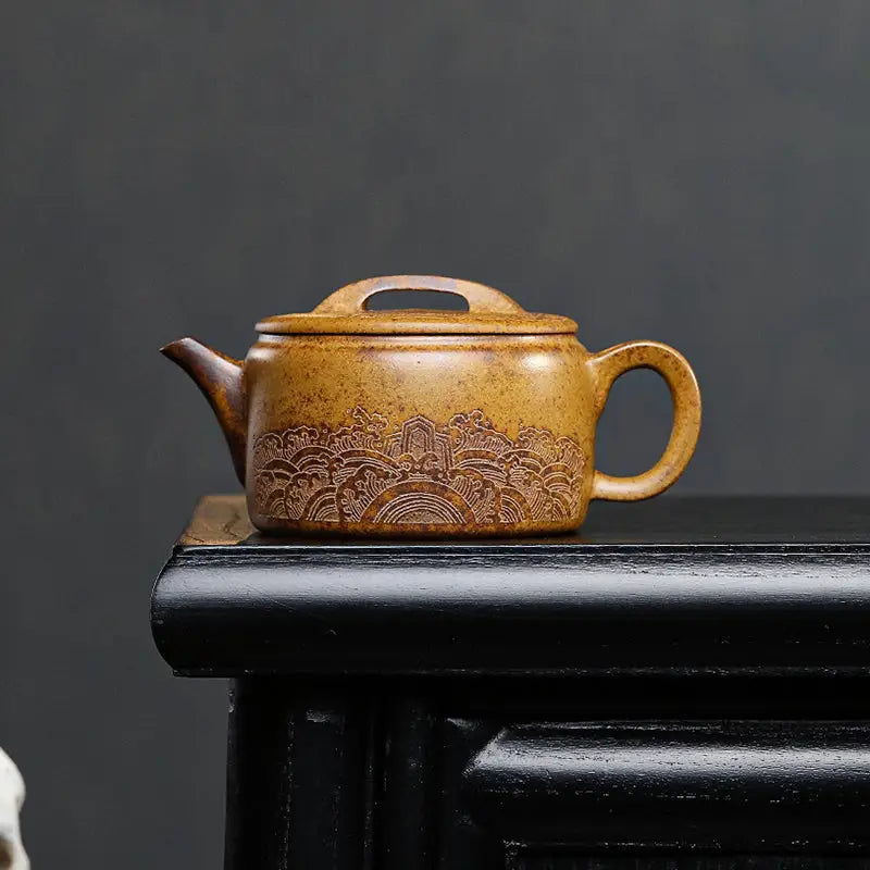 Ornate brown ceramic Yixing Duanni teapot from Temple Ridge collection