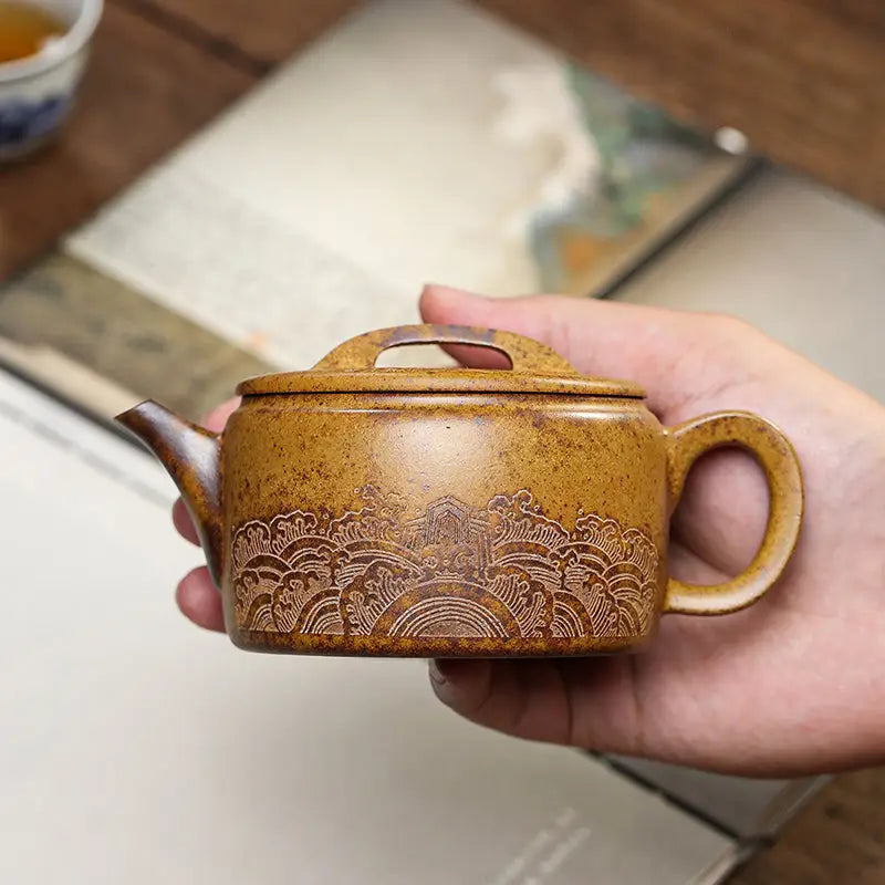 Ornate brown Yixing Duanni ceramic teapot from Temple Ridge collection