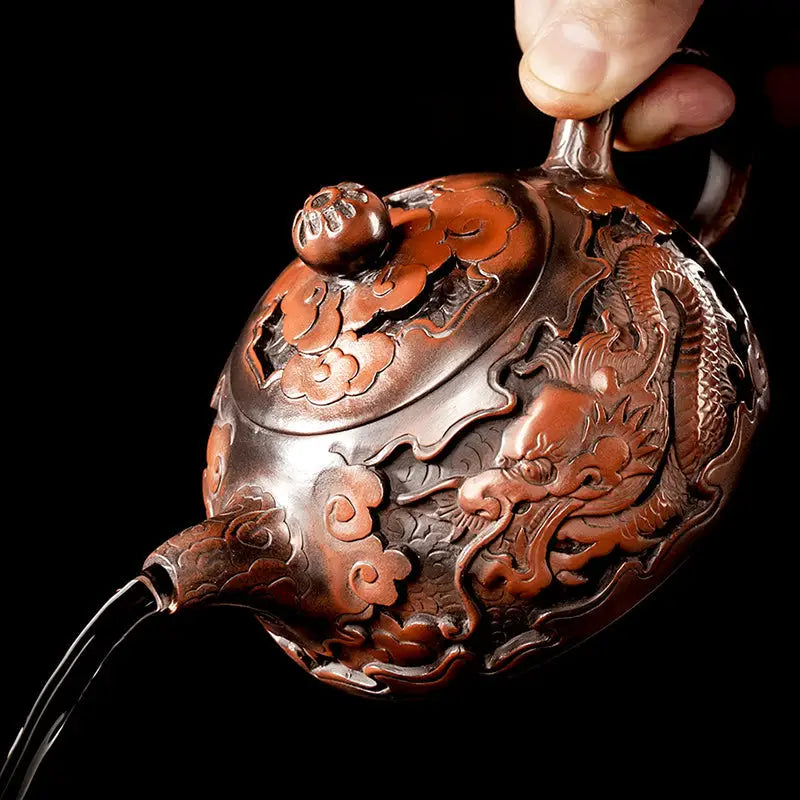 Ornate copper zitao teapot with dragon design inspired by Jianshui Zitao and purple Zitao Teapot styles