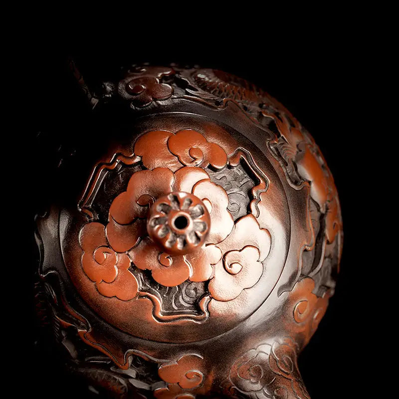 Ornate bronze incense burner from The Dragon featuring Jianshui Zitao purple design