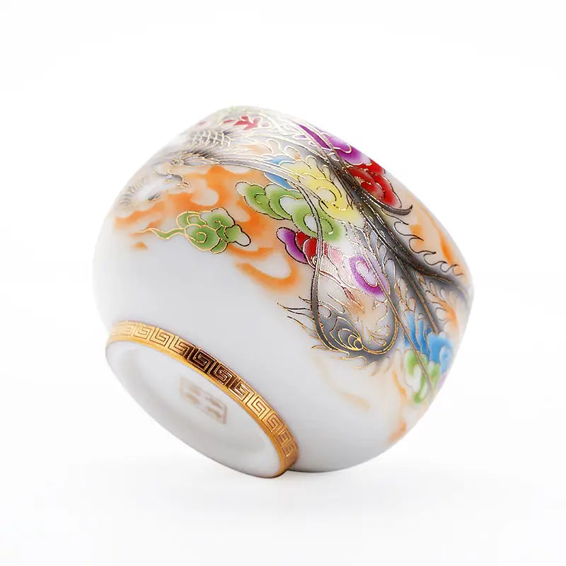 Ornate porcelain tea cup from The Phoenix for gongfu tea brewing and elegant tea service