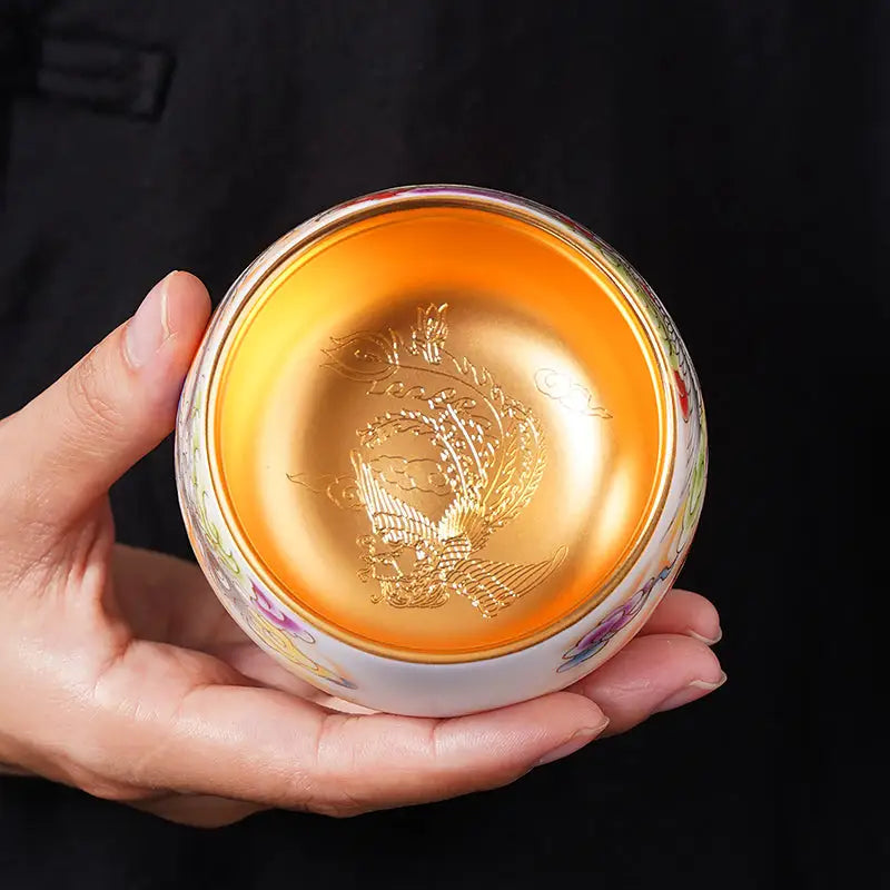 Ornate golden bowl from The Phoenix, perfect for gongfu tea and porcelain tea cups