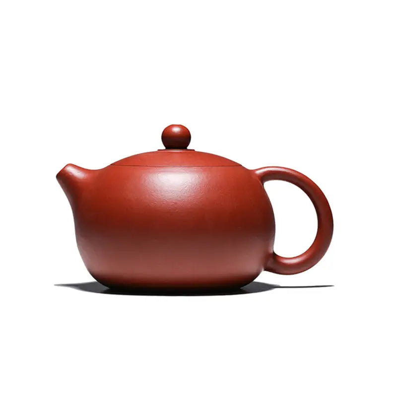 Reddish-brown handmade Yixing Zisha teapot in red clay from The Still Moon