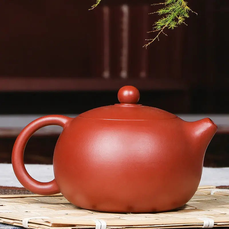 Reddish-brown Handmade Yixing Zisha Teapot from The Still Moon in red clay
