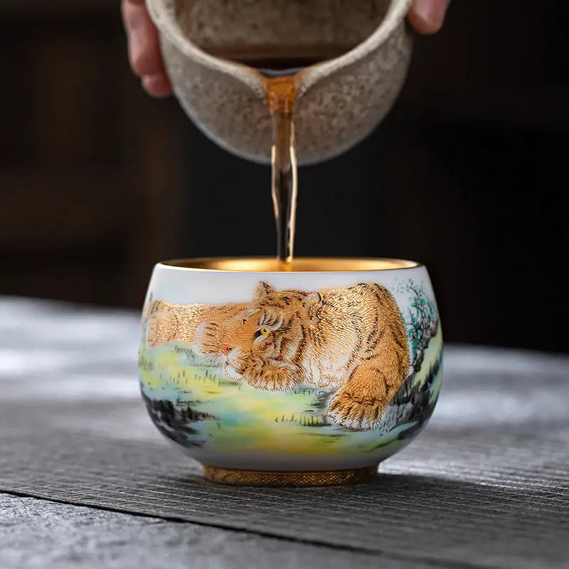 Tiger-themed teacup being filled, perfect for Gongfu Tea and tea sets enthusiasts