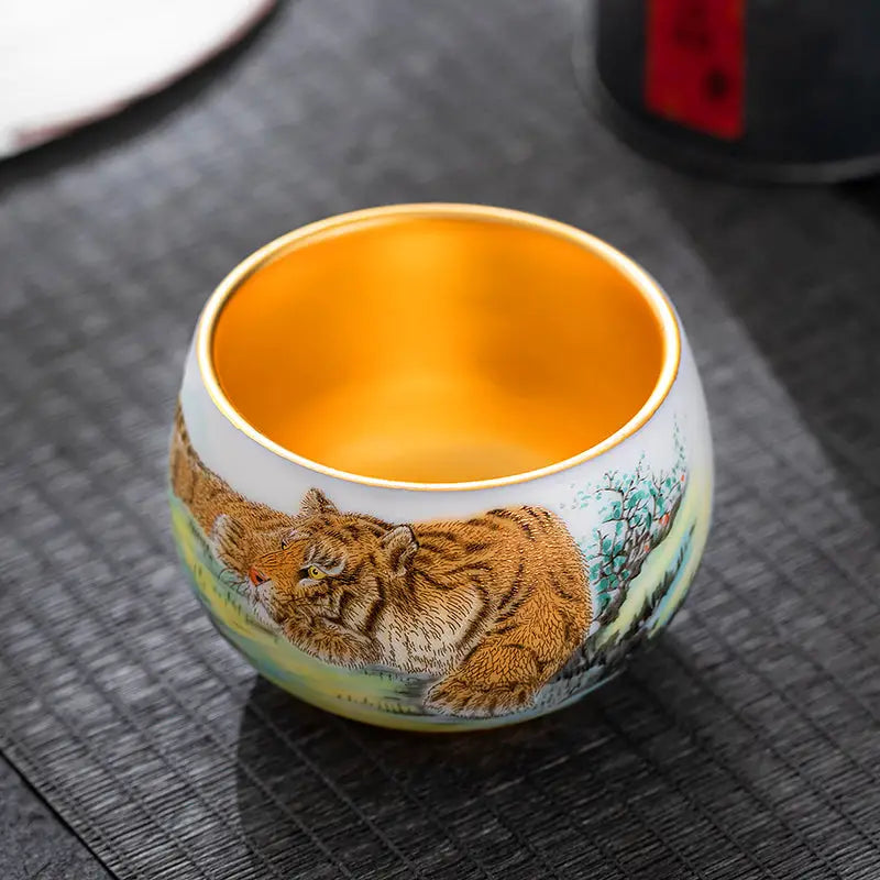 Tiger-themed gold-lined ceramic cup for gongfu tea and tea sets display