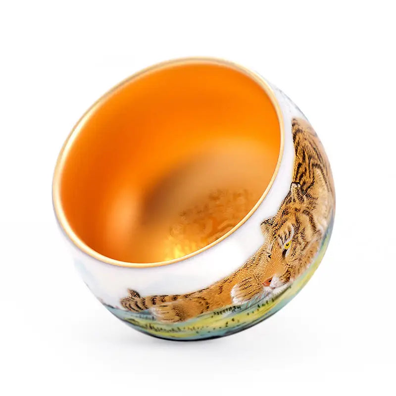 Tiger-themed decorative bowl with golden interior for Gongfu tea, teapots, and tea sets