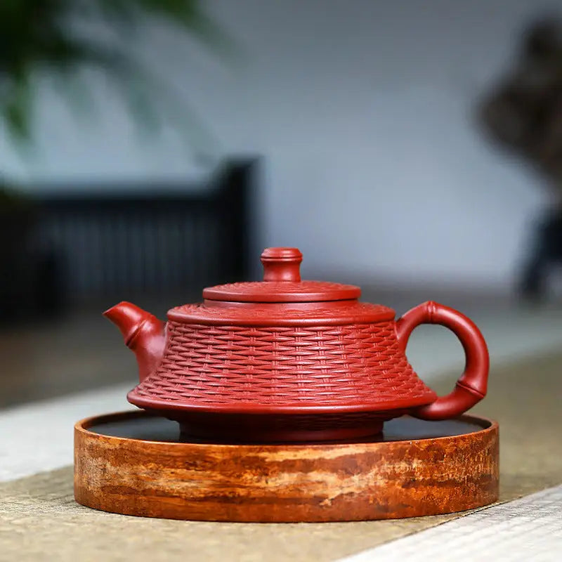 Red woven-textured Zisha teapot from The Woven Harmony made of Yixing Zisha clay