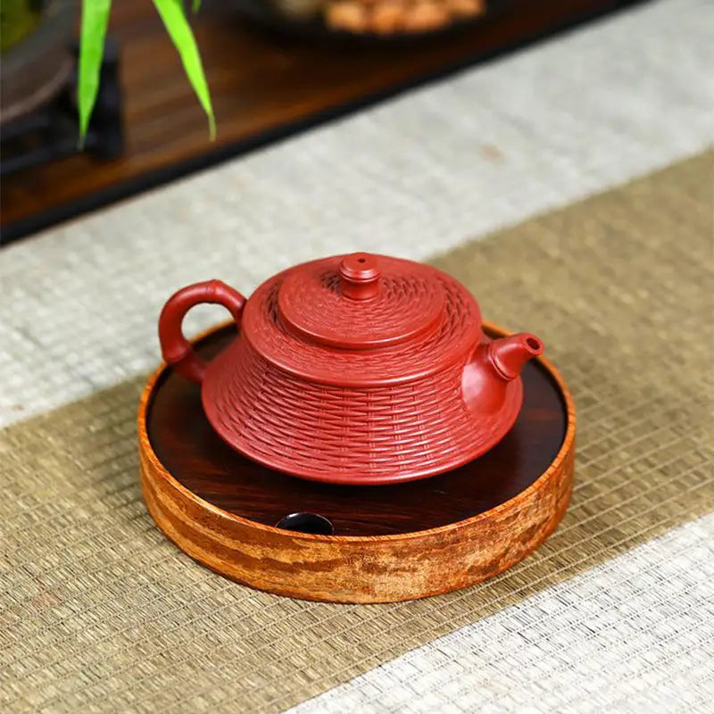 Red textured Yixing Zisha clay teapot from Woven Harmony for true tea connoisseurs
