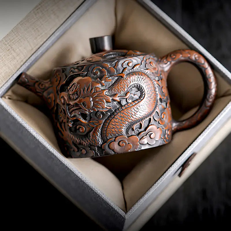 Ornate three-dimensional dragon-themed Jianshui Zitao teapot in a box, a unique collectible teapot