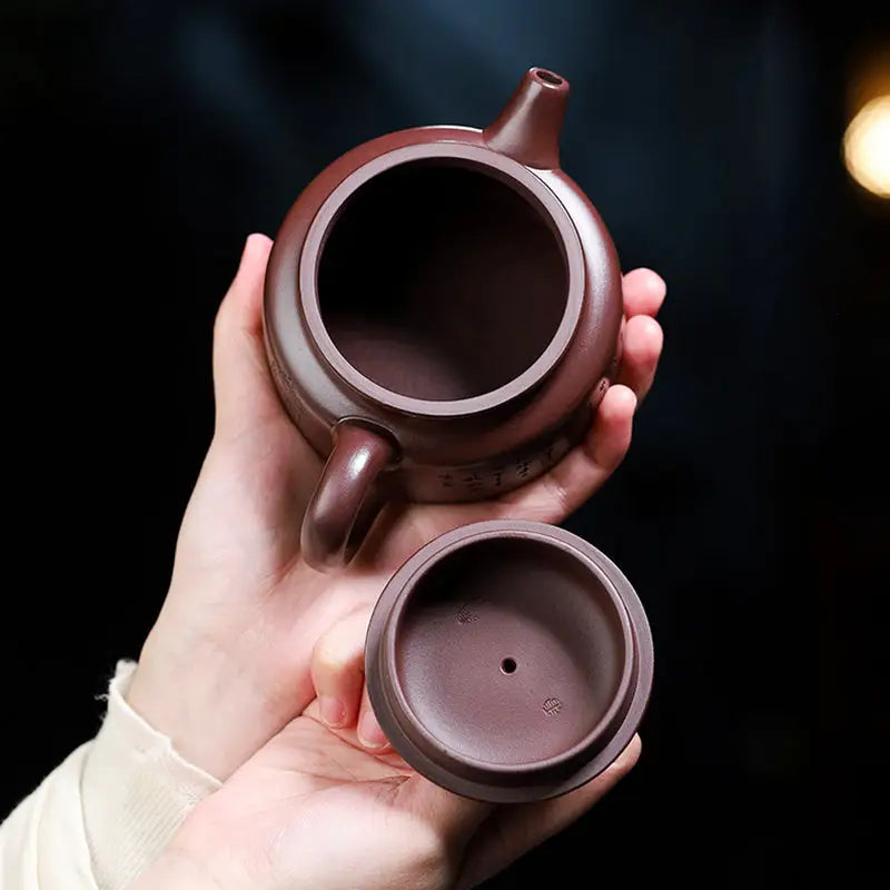 Open purple Yixing Zisha teapot with lid from Tidal Horizon collection