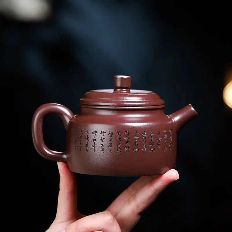 Maroon Tidal Horizon Yixing Zisha Teapot with Chinese characters for elegant tea brewing