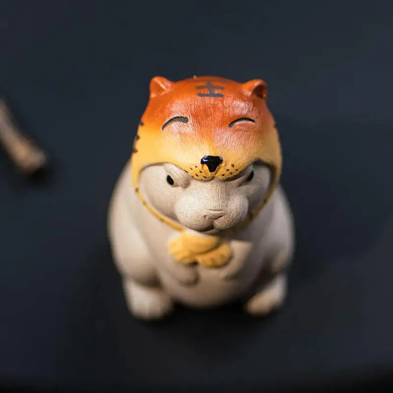 Wooden tiger figurine from Tiger Spirit Hammy, a yixing tea pet for feng shui tea ritual