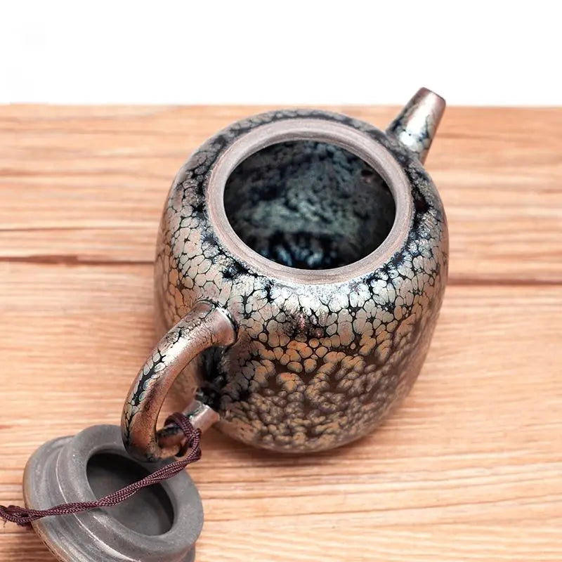 Crackle-glazed ceramic teapot crafted with crystalline glaze in jian zhan style from handcrafted Jianyang