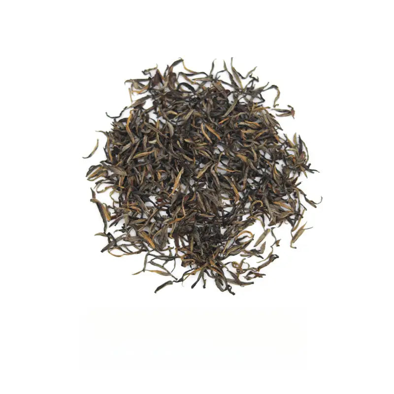 Pile of dried Jin Jun Mei black tea leaves for Tongmu Jin Jun Mei 2025 Golden Eyebrow Black Tea
