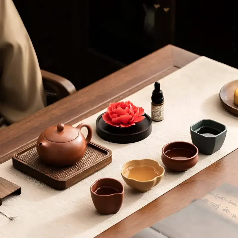 Tranquil Bloom Tea Set featuring a Yixing Zisha Teapot and cups for peaceful brewing