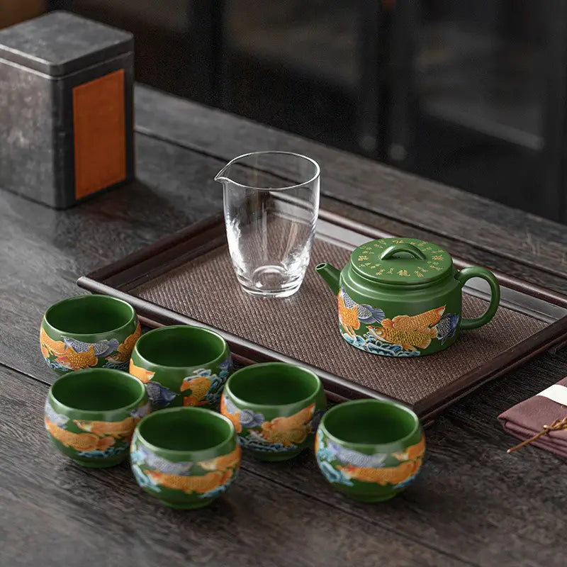 Tranquil Fir Tea Set in Yixing Zisha Clay with Fish Design for Relaxing Tea Time