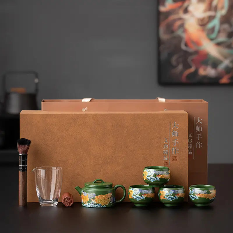 Green tea set with floral design featuring tranquil fir and yixing zisha clay craftsmanship