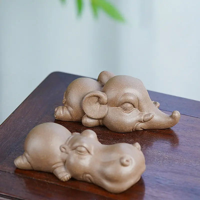 Sleeping elephant and hippo figurines from Tranquil Hippo Yixing earth element tea pet
