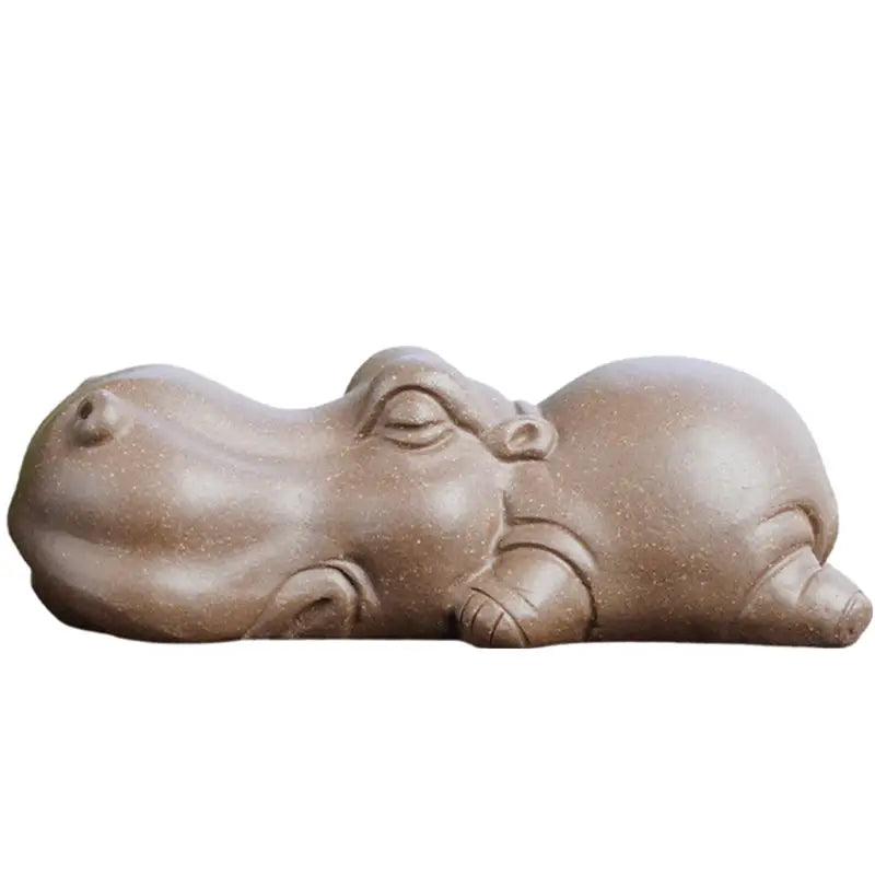 Sleeping hippo figurine from Tranquil Hippo Yixing earth element tea pet collection