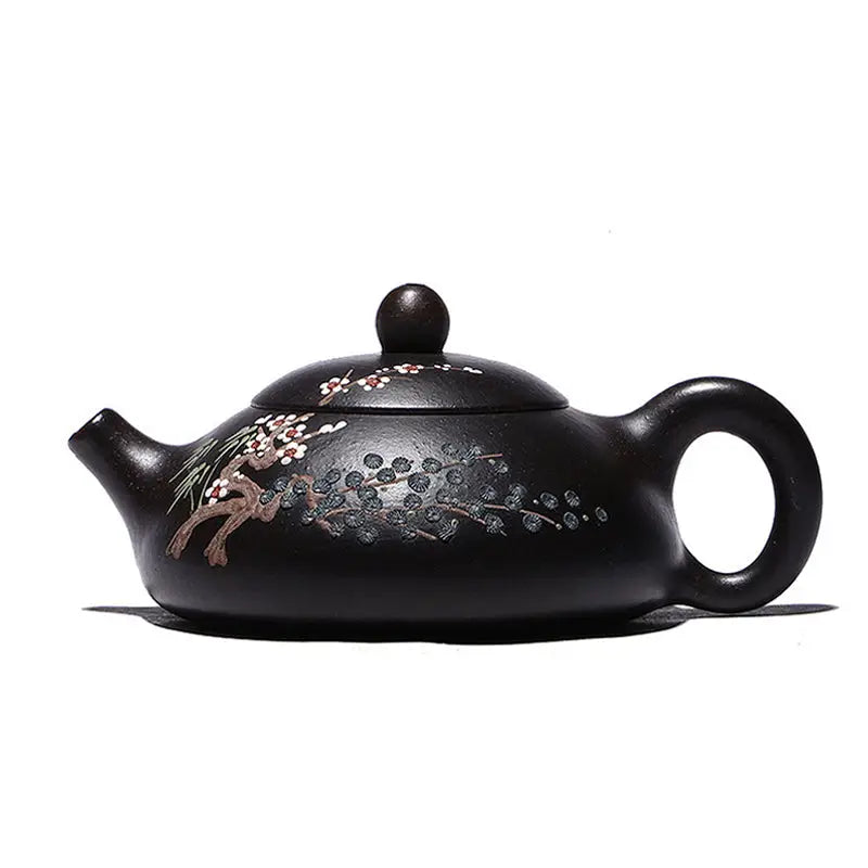 Dark ceramic teapot with hand-painted plum blossoms in Twilight Plum Yixing black Zisha clay