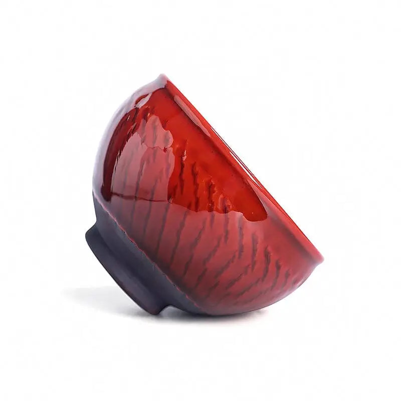Glossy blood-red glaze teacup from Jian Zhan Vampire collection with bold crimson Zhan