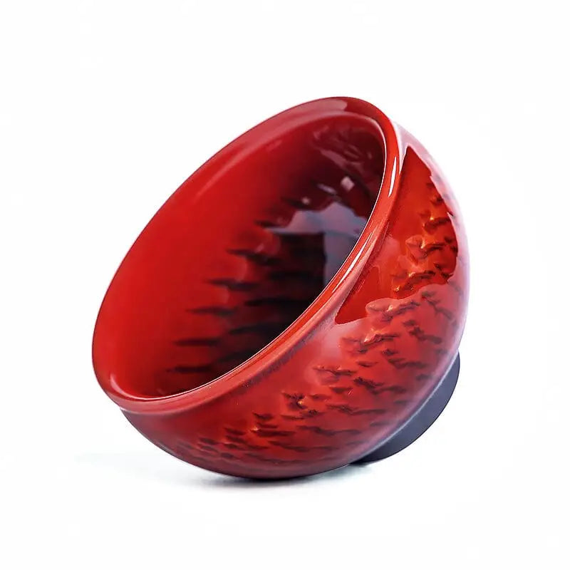 Red and black textured ceramic bowl from Vampire with bold crimson zhan blood-red glaze