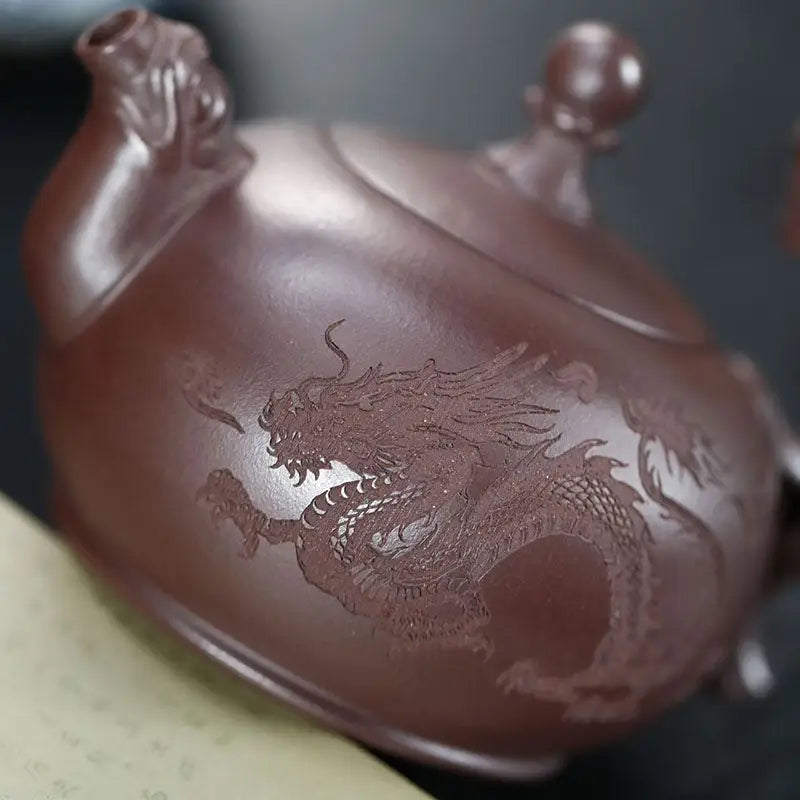 Brown Wandering Dragon Yixing Zisha Teapot with intricate dragon engraving