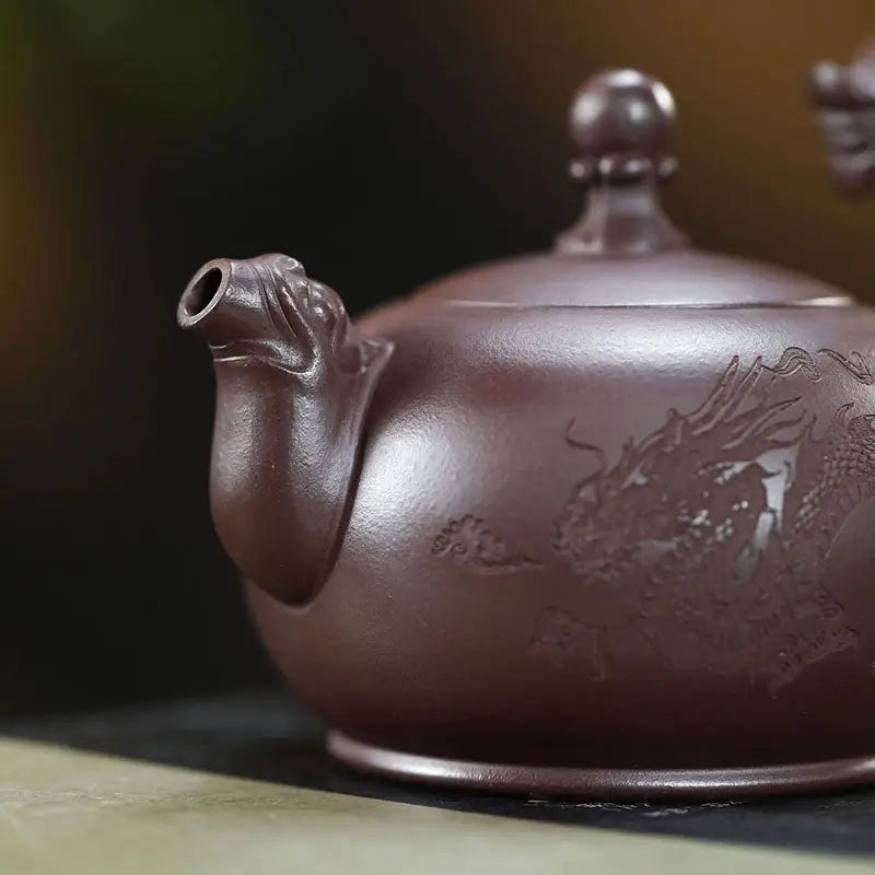 Brown ceramic Wandering Dragon Yixing dragon Zisha teapot with intricate design