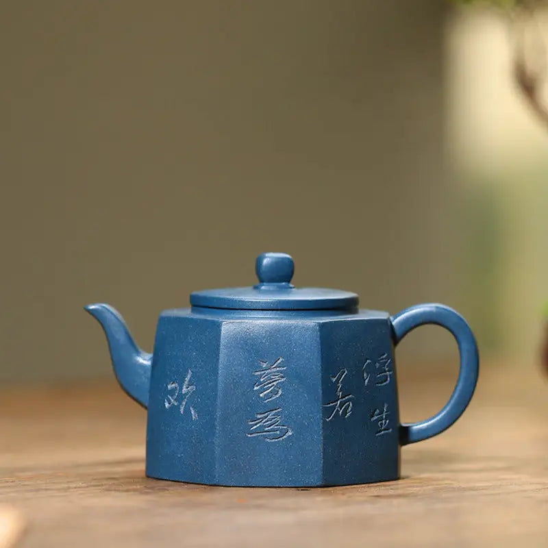Blue octagonal Yixing teapot with Chinese characters from Waves of Mindfulness, modern minimalism