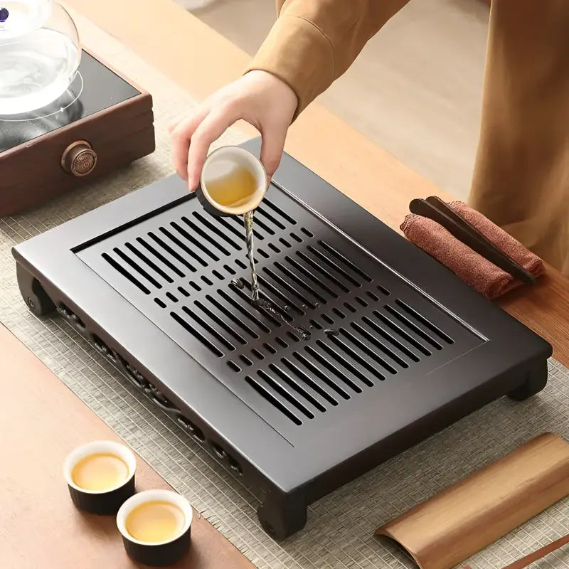 Dark wooden tea tray from Whispering Bamboo for authentic Gongfu Tea ceremonies