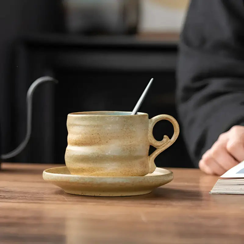 Whispering Earth ceramic coffee cup with spoon for hot beverages and stylish drinkware